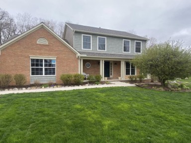 A home with a beautiful new siding installed by Michigan Exterior Pros.