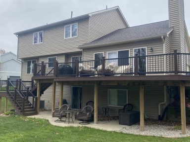 New windows and door installed on a residentail house by Michigan Exterior Pros.