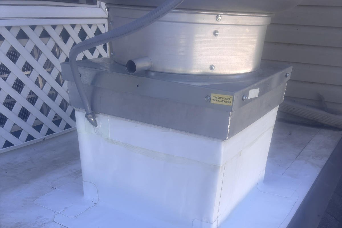 Commercial roof repaired by Michigan Exterior Pros.