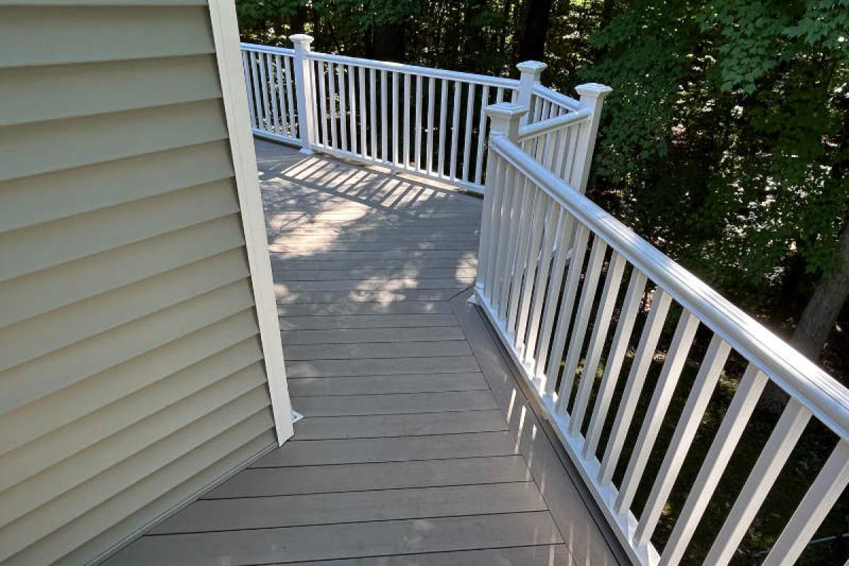 Old wood deck transformed with new composite surface boards