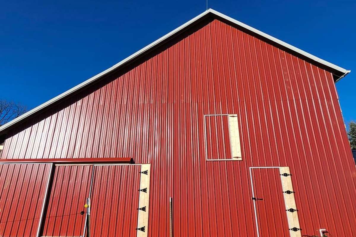 Siding and door replaced by Michigan Exterior Pros.