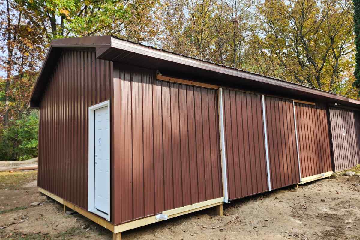 Custom red colored pole barn built by Michigan Exterior Pros.