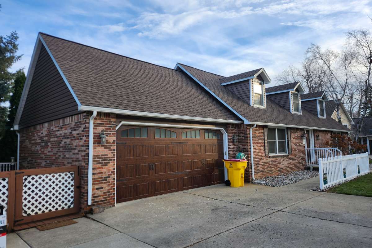 Custom exterior remodeling with vinyl siding done by Michigan Exterior Pros.