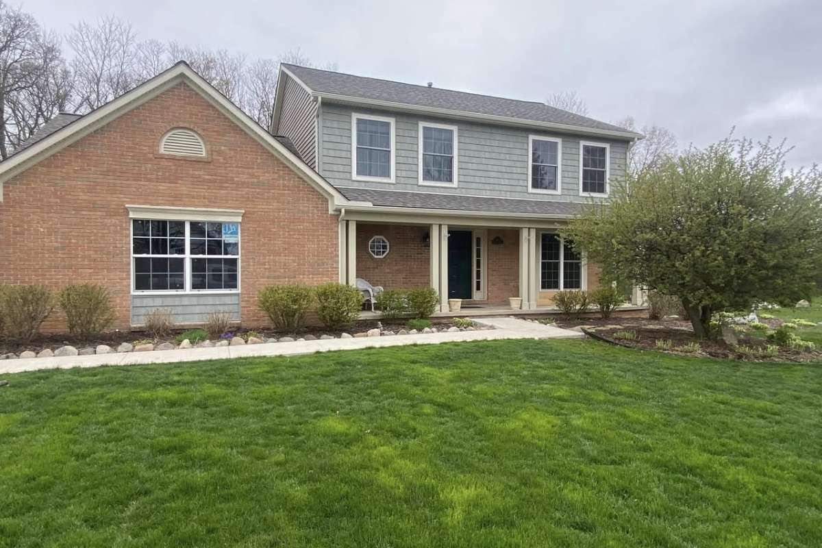 Freshly installed Vinyl Shake Siding by Michigan Exterior Pros.